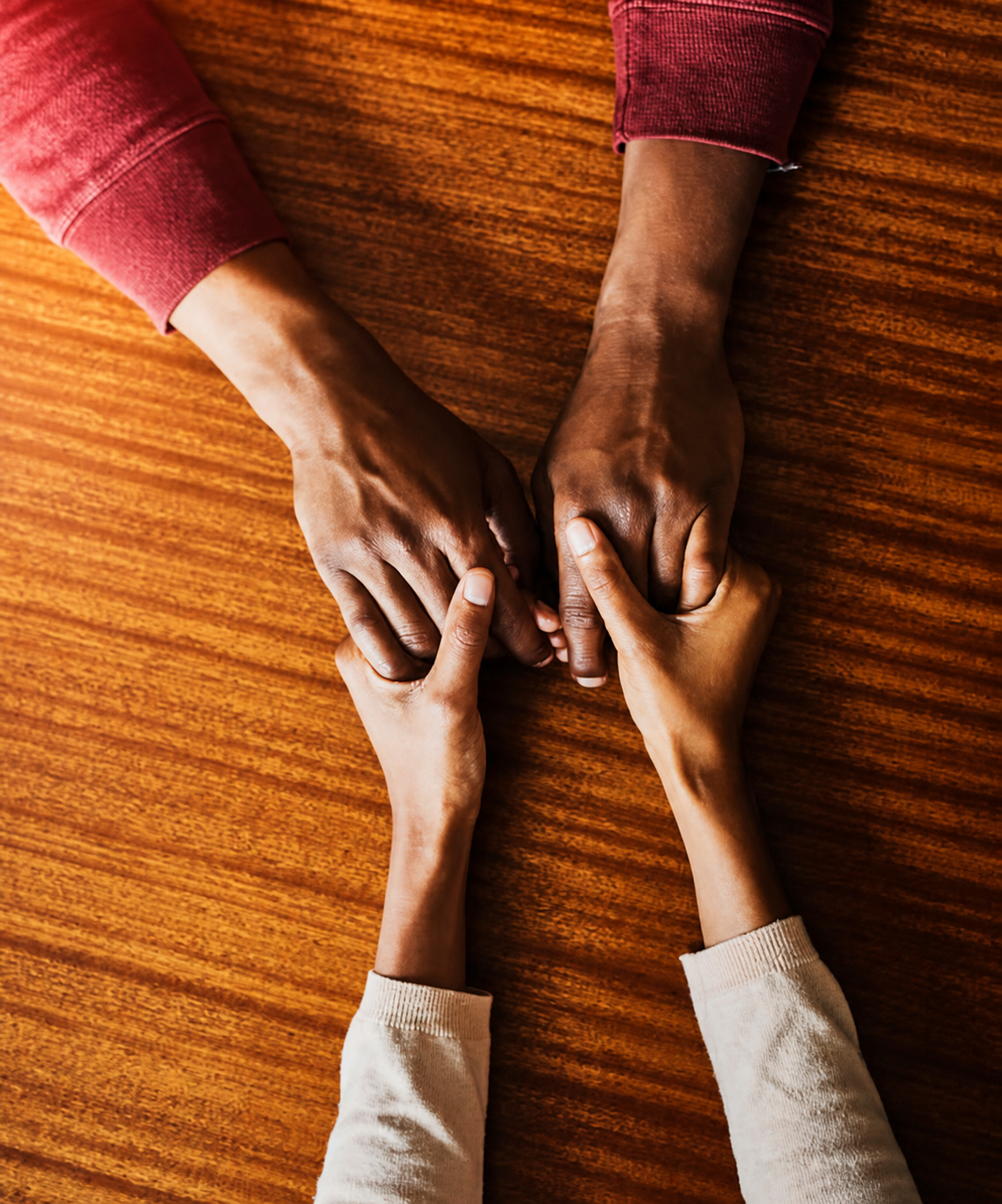 Hands offering support and reassurance
